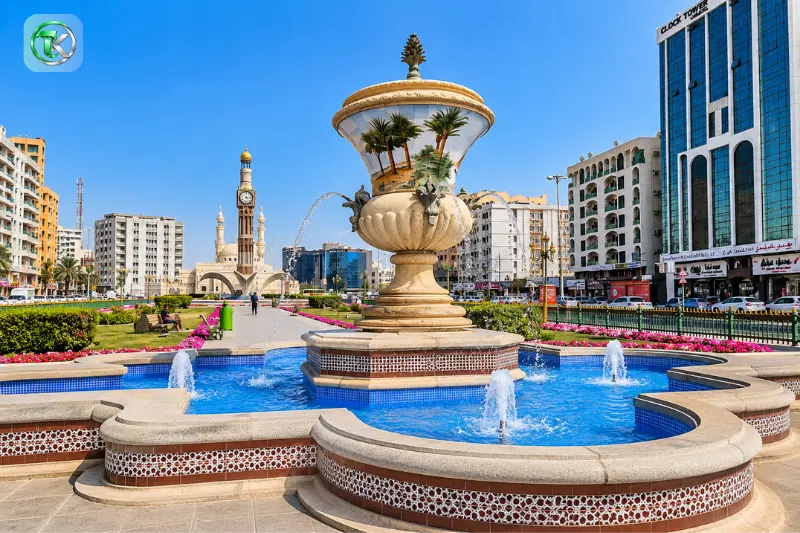 Clock Tower Sharjah and decorative fountain at Al Zahra Square