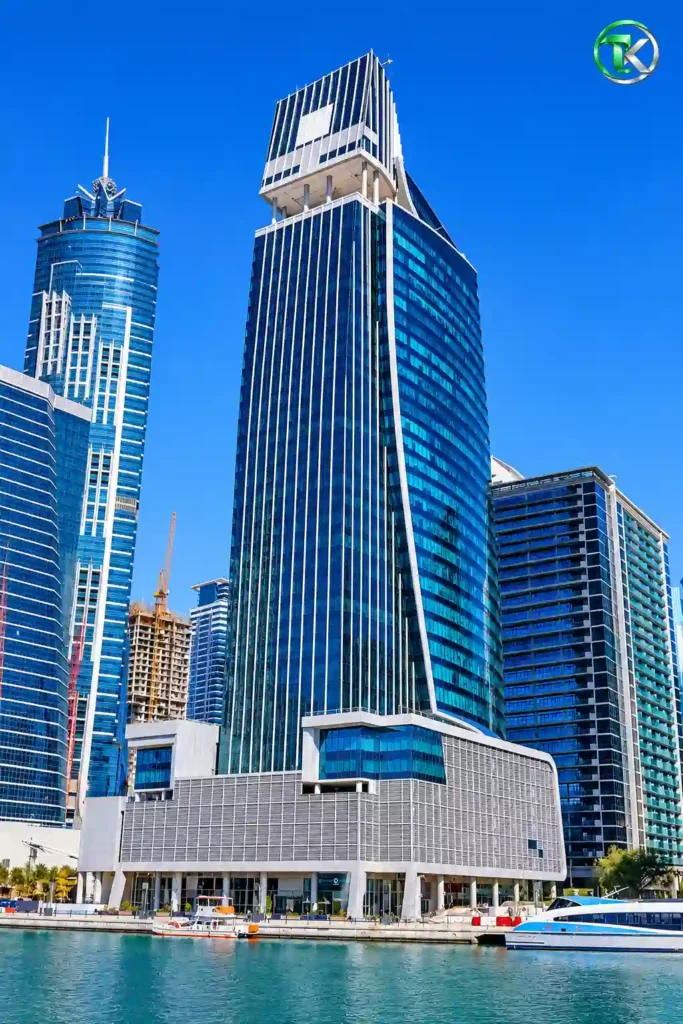 Al Manara Towers modern glass facade overlooking Dubai Water Canal