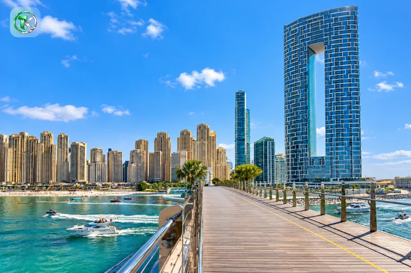 Dubai Marina waterfront promenade with high-rise buildings and marina views